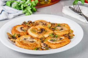 Kartoffelpfannkuchen mit Champignons