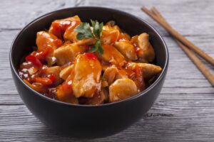 Rindfleisch süß-sauer mit Paprika, Tomate und Zwiebel